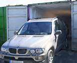 Storing car in shipping container