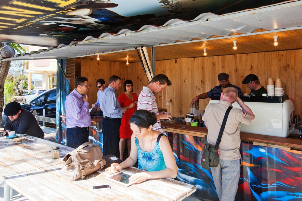 Customers at Mambo shipping Container Coffee Shop